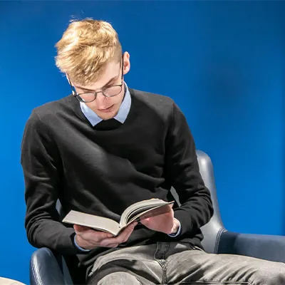 a student reads a book
